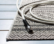 Load image into Gallery viewer, Courtyard Black/Gray 4 ft. x 6 ft. Chevron Tribal Indoor/Outdoor Area Rug
