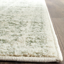 Load image into Gallery viewer, SAFAVIEH Adirondack Collection 9&#39; x 12&#39; Ivory / Sage Oriental Distressed Non-Shedding Living Room Bedroom Dining Home Office Area Rug
