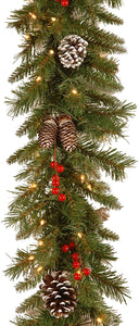 National Tree Company Pre-Lit Artificial Christmas Garland, Green, Frosted Berry, White Lights, Decorated with Pine Cones, Berry Clusters, Plug In, Christmas Collection, 9 Feet
