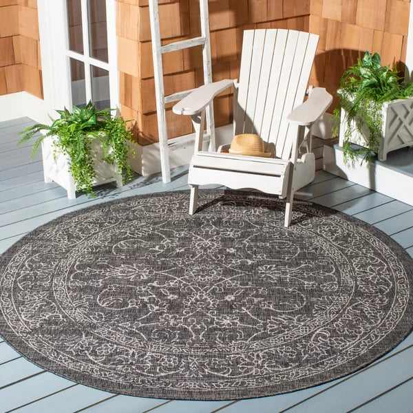 Amedee Floral Indoor / Outdoor Area Rug in Black/Ivory 4' round