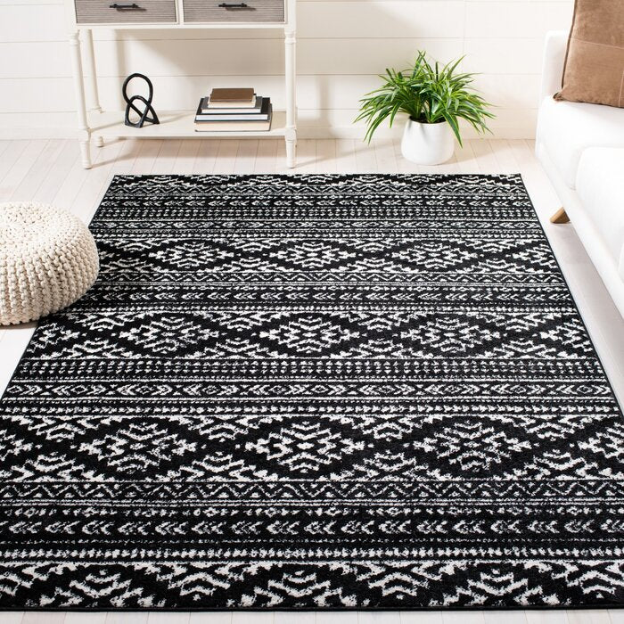 Cobos Geometric Area Rug in Black, Rectangle 6' x 9'