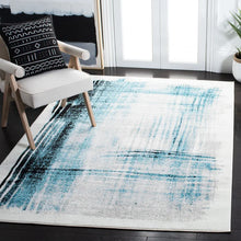 Load image into Gallery viewer, Deliah Power Loom Performance Ivory/Teal Rug, Rectangle 6&#39; x 9&#39;
