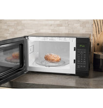 Load image into Gallery viewer, GE® 0.7 Cu. Ft. Capacity Countertop Microwave Oven
