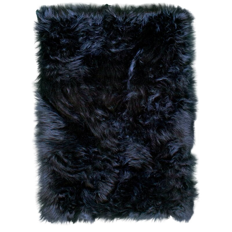 Dominick Handmade Shag Faux Sheepskin Black Area Rug , Rectangle 4' x 6'