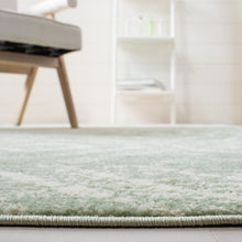 Load image into Gallery viewer, Geometric Green/Ivory Area Rug
