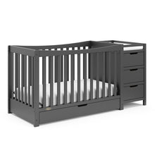 Load image into Gallery viewer, Graco Remi 4-in-1 Convertible Crib and Changer with Storage
