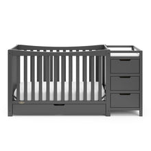 Load image into Gallery viewer, Graco Remi 4-in-1 Convertible Crib and Changer with Storage
