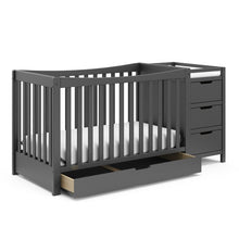Load image into Gallery viewer, Graco Remi 4-in-1 Convertible Crib and Changer with Storage
