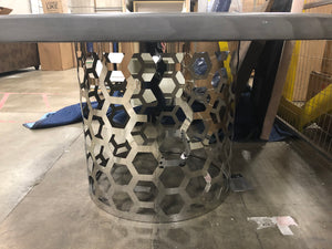Gray round table with metal honeycomb base