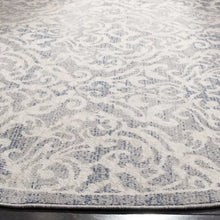 Load image into Gallery viewer, Llana Ikat Area Rug in Light Gray/Blue
