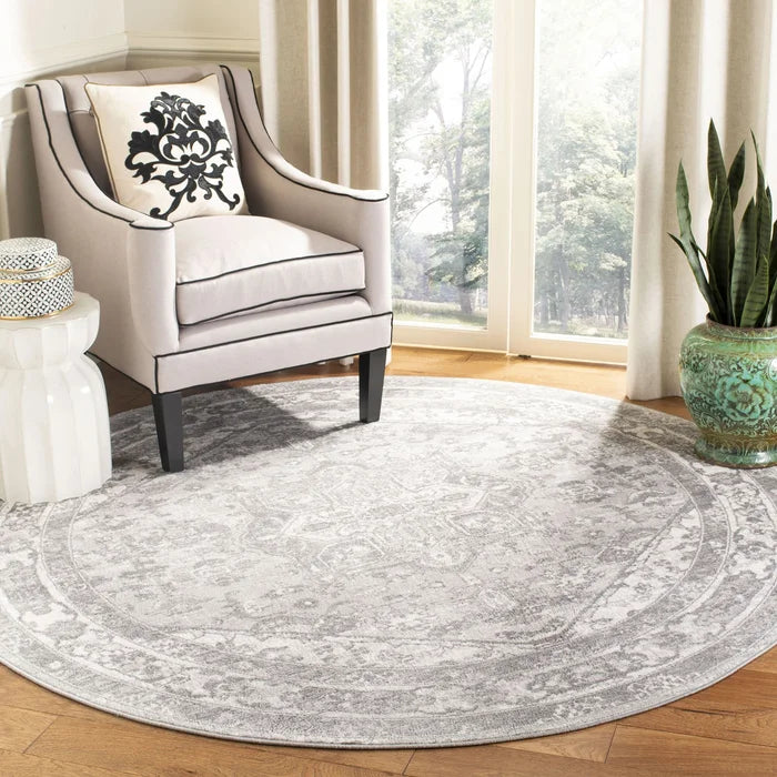 Llana Oriental Area Rug in Cream/Gray Round