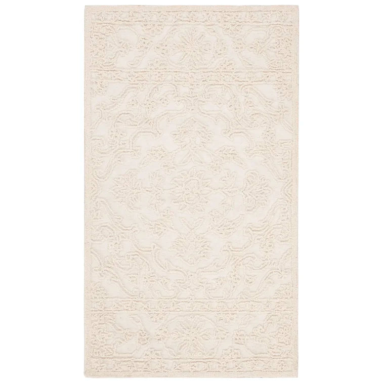 Marys Handmade Tufted Wool Area Rug in Ivory, Rectangle 6' x 9'
