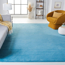 Load image into Gallery viewer, Moreau Handmade Tufted Wool Area Rug in Turquoise, Rectangle 10&#39; x 14&#39;
