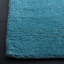 Load image into Gallery viewer, Moreau Handmade Tufted Wool Area Rug in Turquoise, Rectangle 10&#39; x 14&#39;

