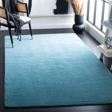 Load image into Gallery viewer, Moreau Handmade Tufted Wool Area Rug in Turquoise, Rectangle 10&#39; x 14&#39;
