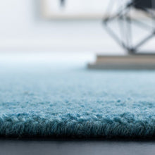 Load image into Gallery viewer, Moreau Handmade Tufted Wool Area Rug in Turquoise, Rectangle 10&#39; x 14&#39;
