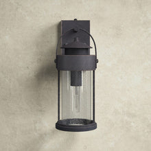 Load image into Gallery viewer, 16.25&quot; H x 6&quot; W x 7.75&quot; D Pranay Rust Iron 1 - Bulb Seeded Glass Outdoor Wall Lantern with Dusk to Dawn
