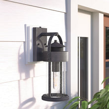 Load image into Gallery viewer, 16.25&quot; H x 6&quot; W x 7.75&quot; D Pranay Rust Iron 1 - Bulb Seeded Glass Outdoor Wall Lantern with Dusk to Dawn
