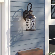 Load image into Gallery viewer, Provencher Textured Black 16.5&#39;&#39; H Seeded Glass Outdoor Wall Lantern with Dusk to Dawn
