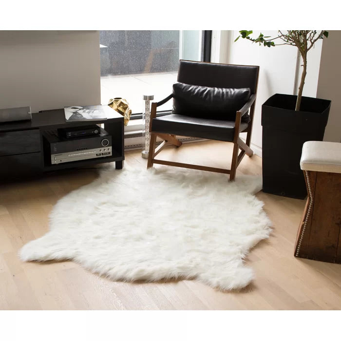 Sheilah Faux Sheepskin Area Rug in White, 4'3