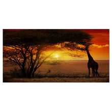 Load image into Gallery viewer, Typical African Sunset With Giraffe - Wrapped Canvas Photograph, 16&quot; H x 32&quot; W x 1&quot; D
