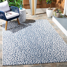 Load image into Gallery viewer, Tyron Animal Print Indoor / Outdoor Area Rug in Ivory/Navy, Rectangle 2&#39;7&quot; x 5&#39;
