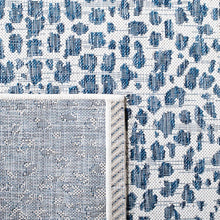 Load image into Gallery viewer, Tyron Animal Print Indoor / Outdoor Area Rug in Ivory/Navy, Rectangle 2&#39;7&quot; x 5&#39;
