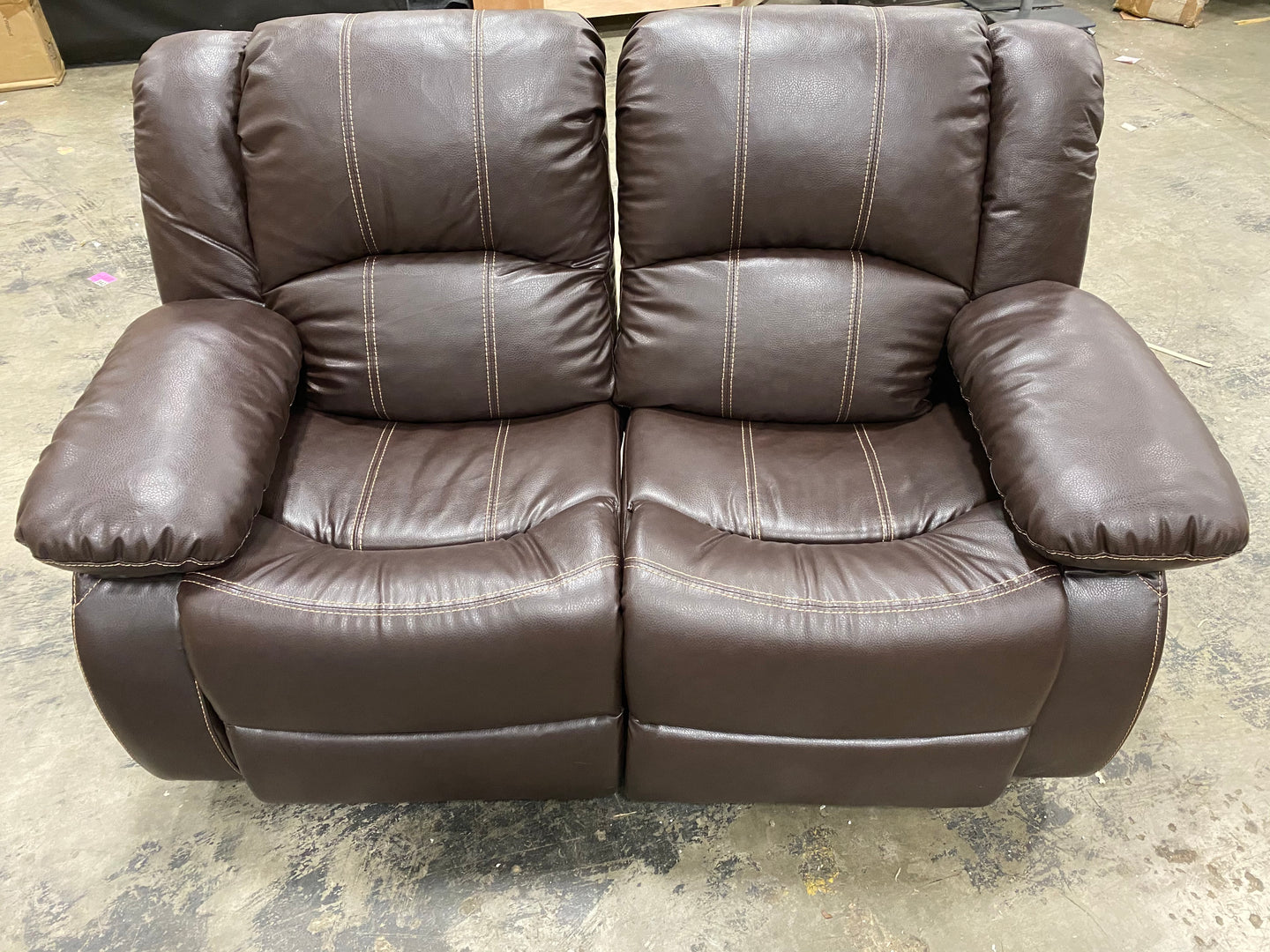 Hattie Faux Leather Reclining Loveseat AS IS Brown